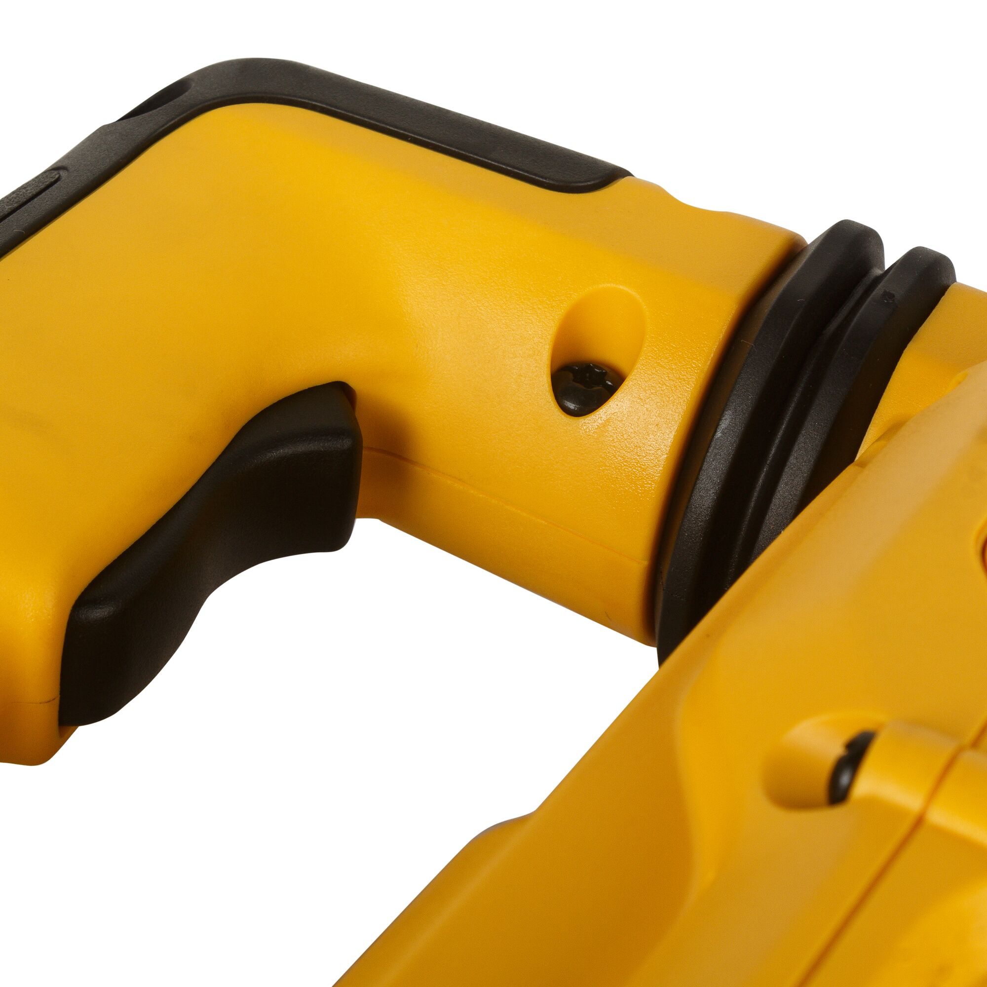Close-up view of a yellow and black handle of a Dewalt power tool, showing part of its ergonomic grip and trigger.