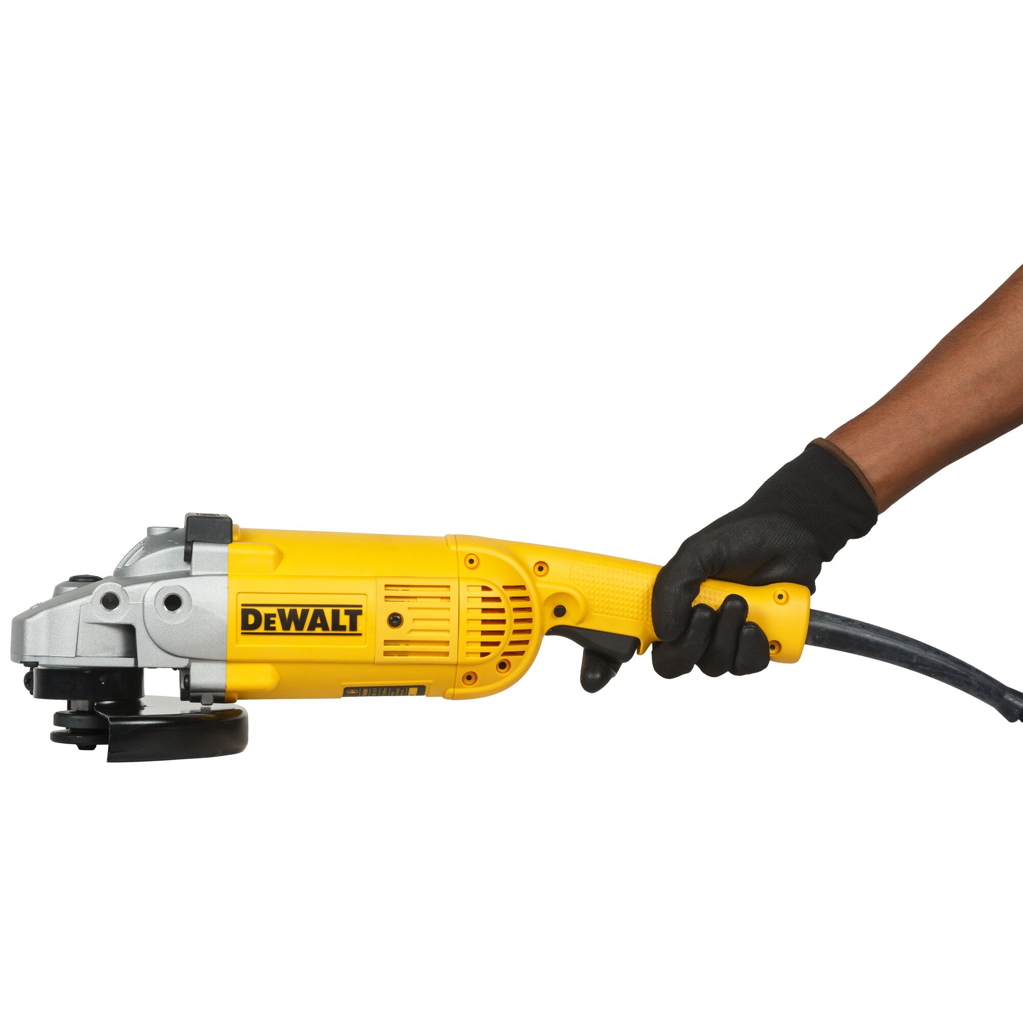 A person wearing a black glove holds a yellow DEWALT angle grinder, model D28413, with a power cord attached.