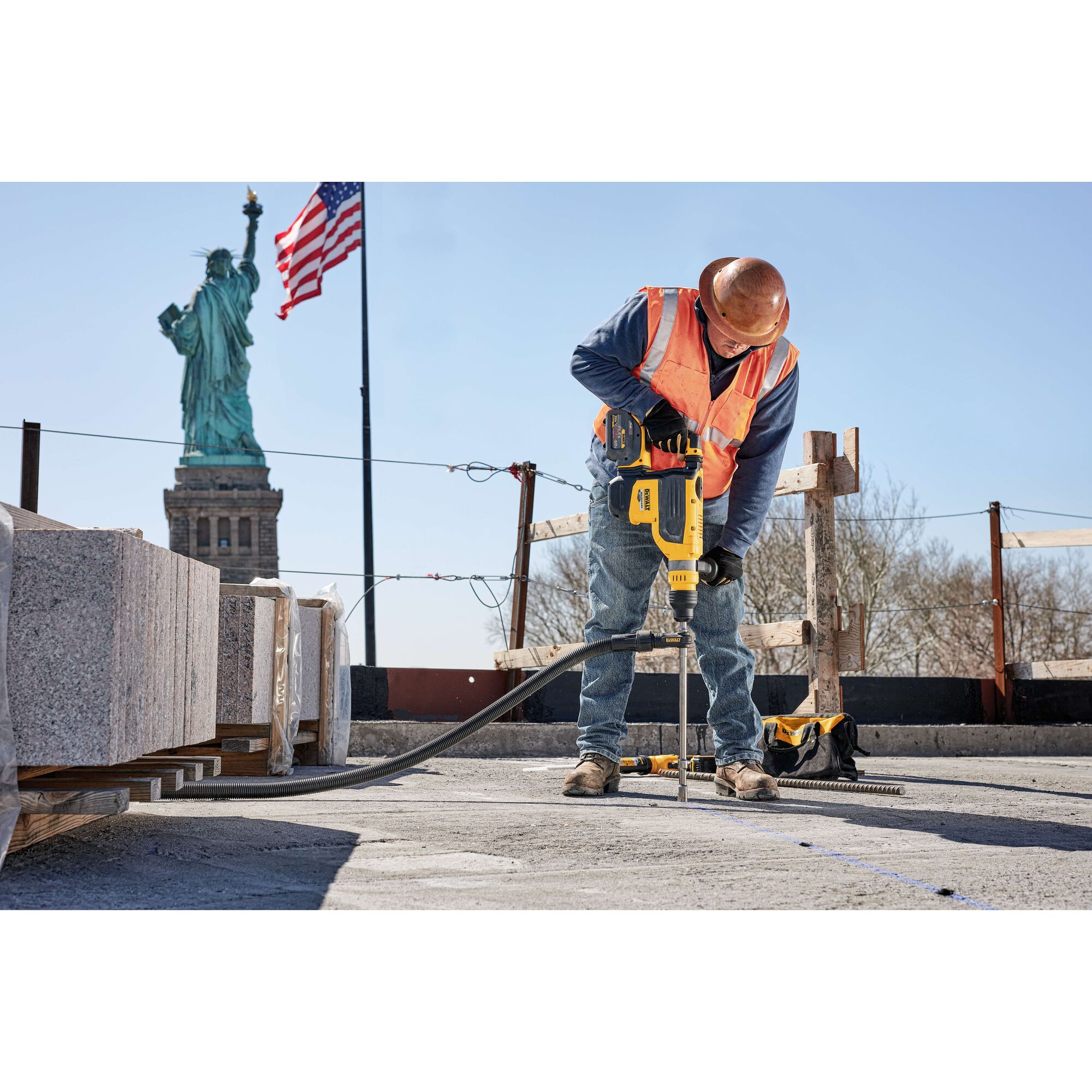 20 Volt to 60 Volt 12 AMP hours Battery-powered Road Drill being used by a construction worker to drill a hole at a construction site