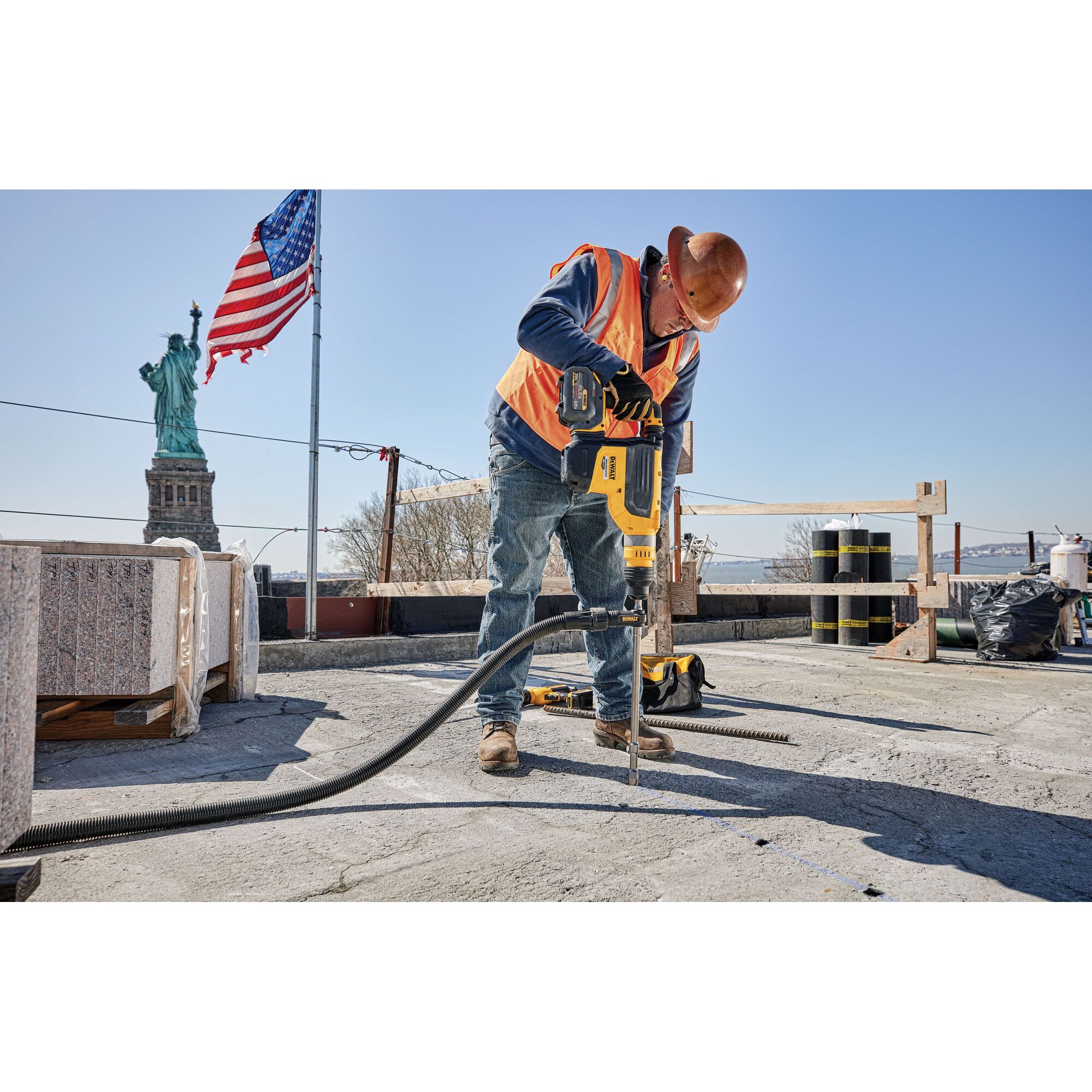 20 Volt to 60 Volt 12 AMP hours Battery-powered Road Drill being used by a construction worker to drill a hole at a construction site
